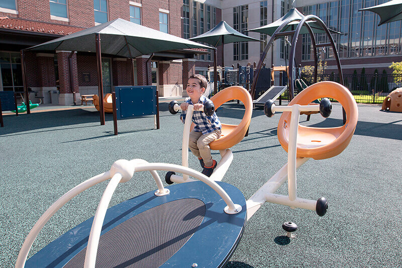 Child in outdoor learning space