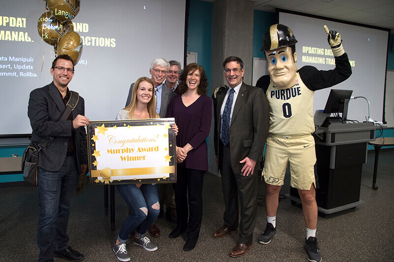 Chad Laux, Kayla Rux, Bertolini, Tom Hacker, Dawn Laux, Frank Dooley, Purdue Pete