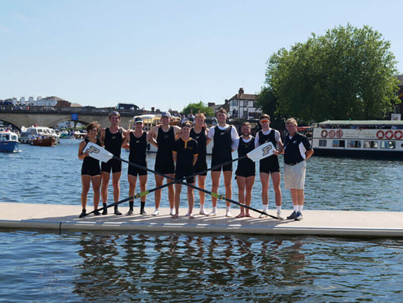 Purdue Crew eights at Henley with coach