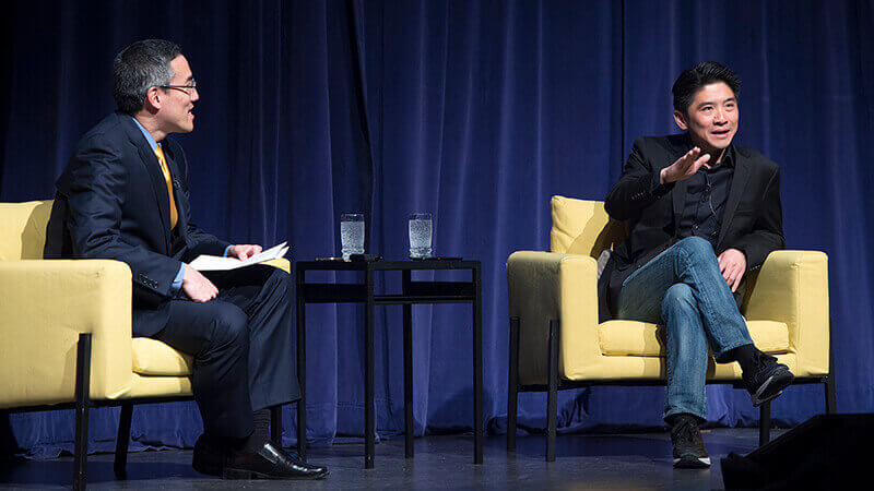 KK Wong onstage with moderator Arnold Chen