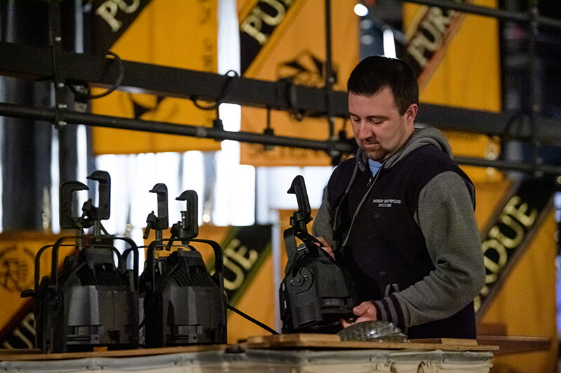 Geoff Gooch assembles lighting equipment