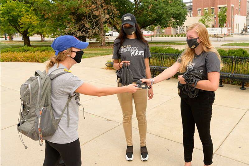 Ambassadors handing out masks