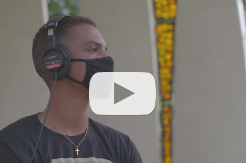 student in mask in image from video