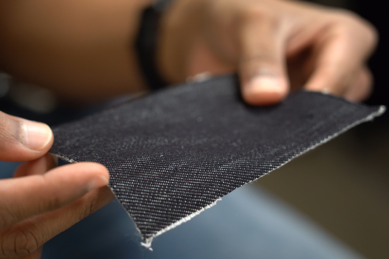 hands holding cool fabric