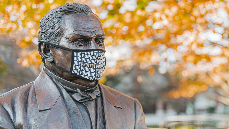 John Purdue statue, masked