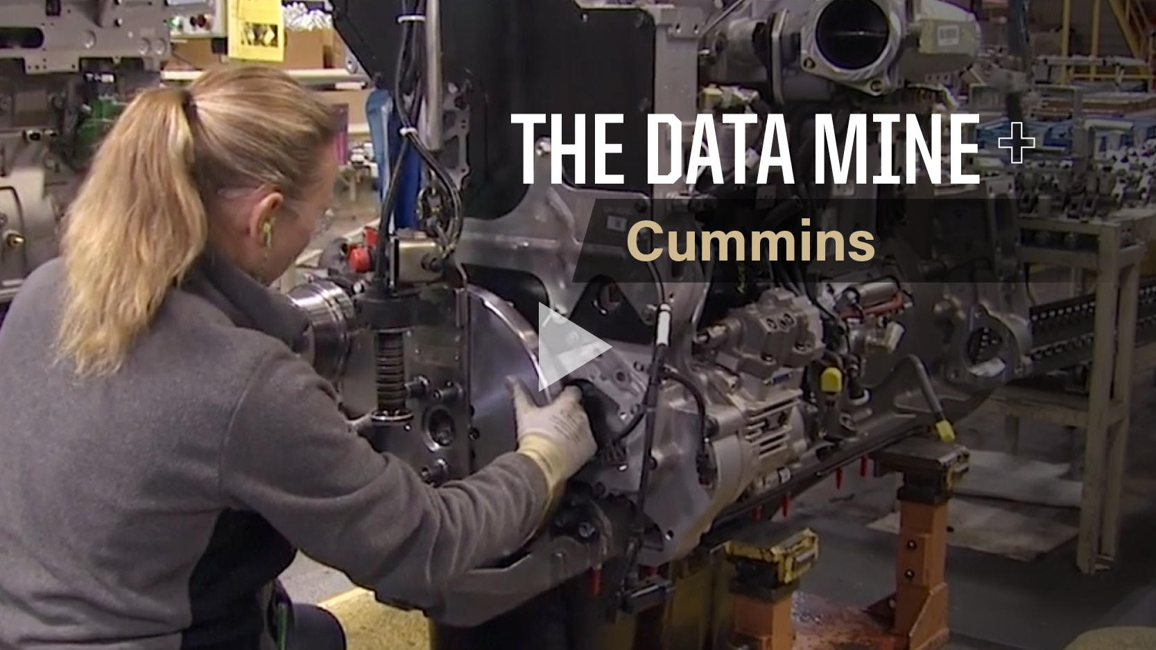 student working at engine in Data Mine graphic