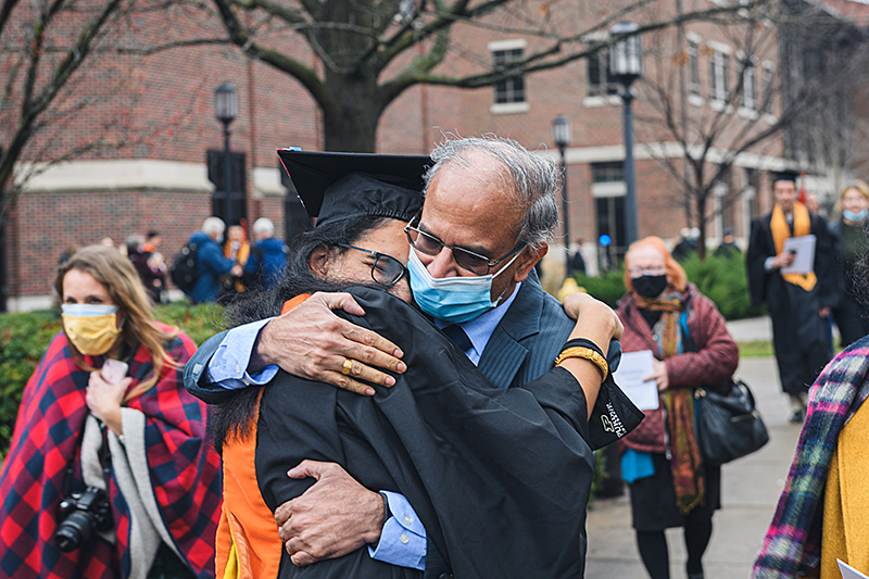 graduate hug