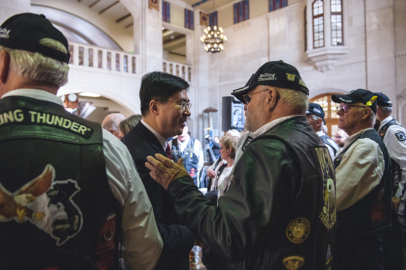 President-elect Mung Chiang talking to members of Rolling Thunder Inc., Indiana Chapter One