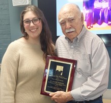 Dr. Ali Frankovich presented with the 2023 Thacker Pathology Fellowship plaque.