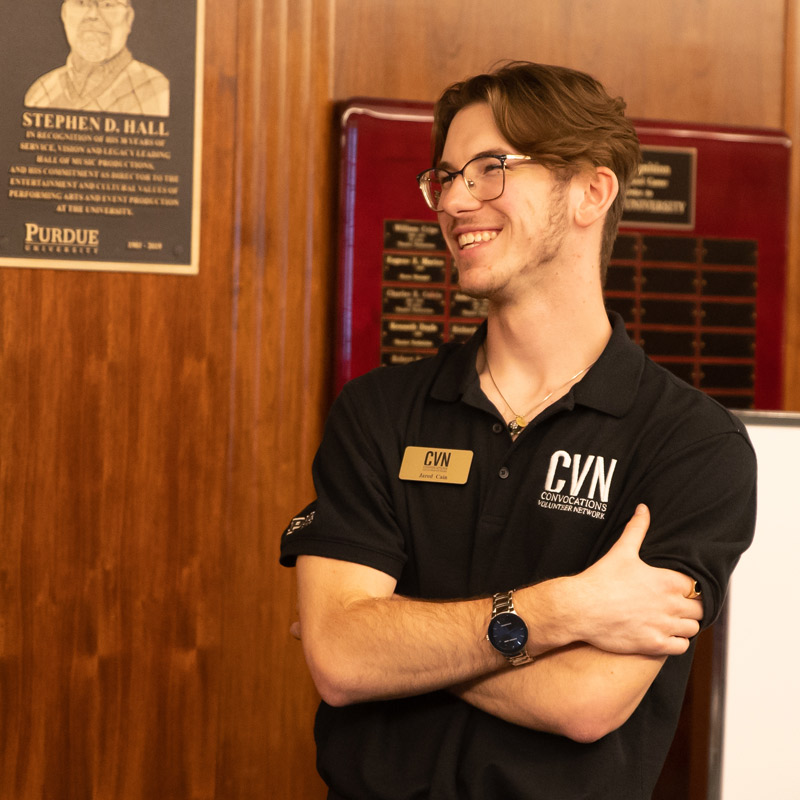 Purdue Convocations staff assist patrons during Spiderman program. 