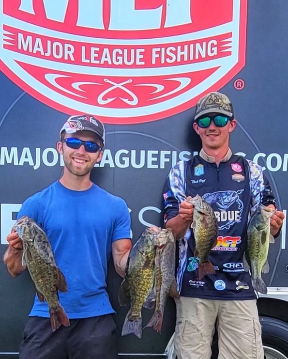 Riley Burgess with a pair of smallmouth bass and Travis Ely with a largemouth at the Major League Fishing College Central Conference event in LaCrosse, Wisconsin.