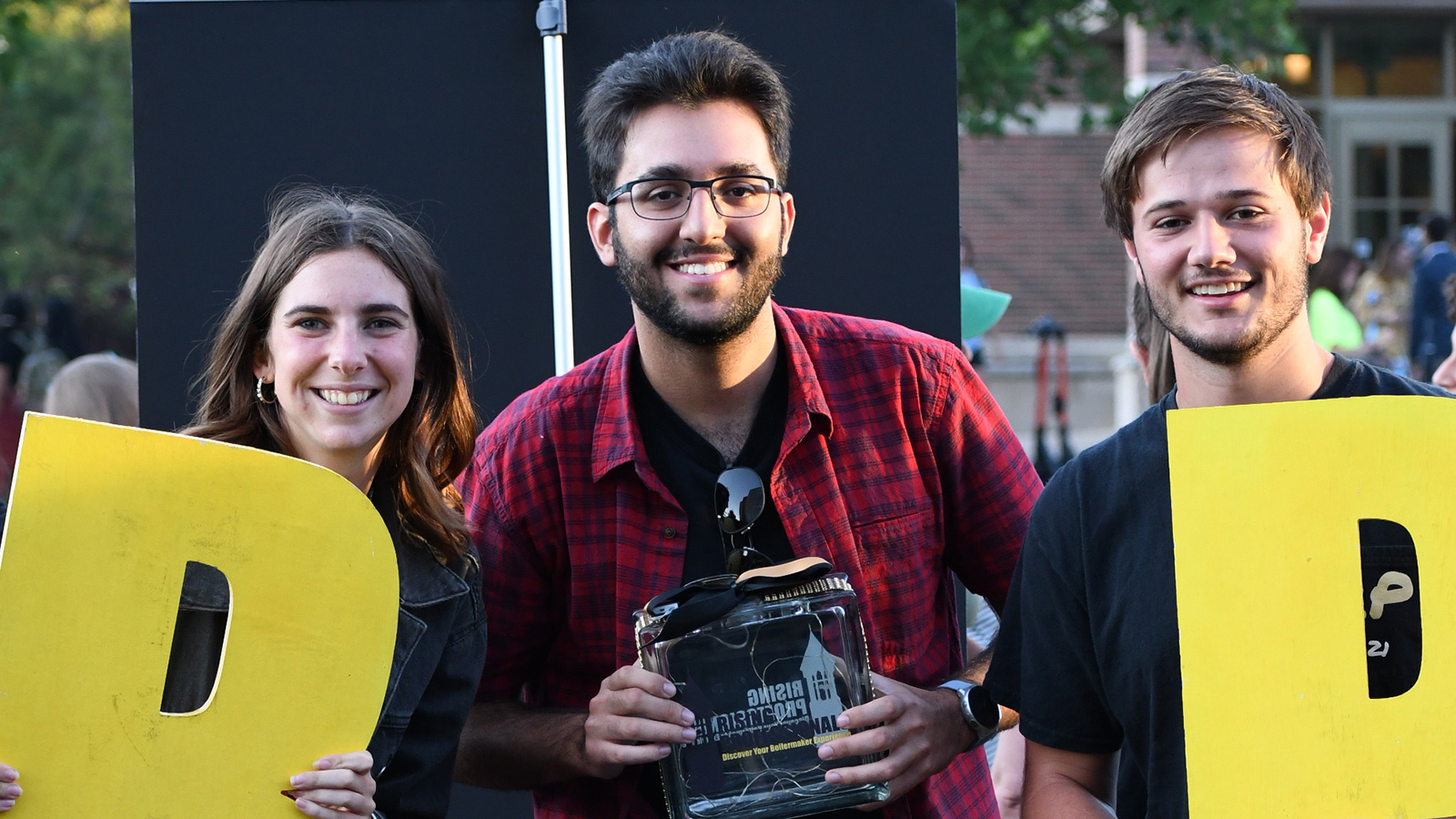 Rising Professionals members pose at Purdue’s LGBTQ Center 2021 Rainbow Callout.
