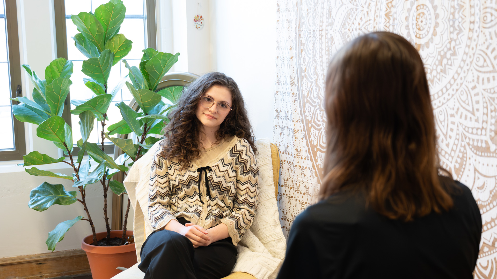 Student in a session with one of the CARE administrators.