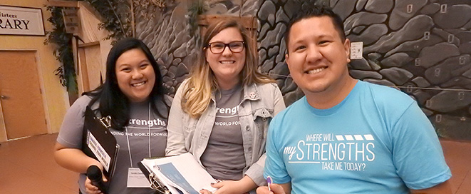 Students and coordinators in a row with myStrengths shirts at EMV leadership development weekend workshop