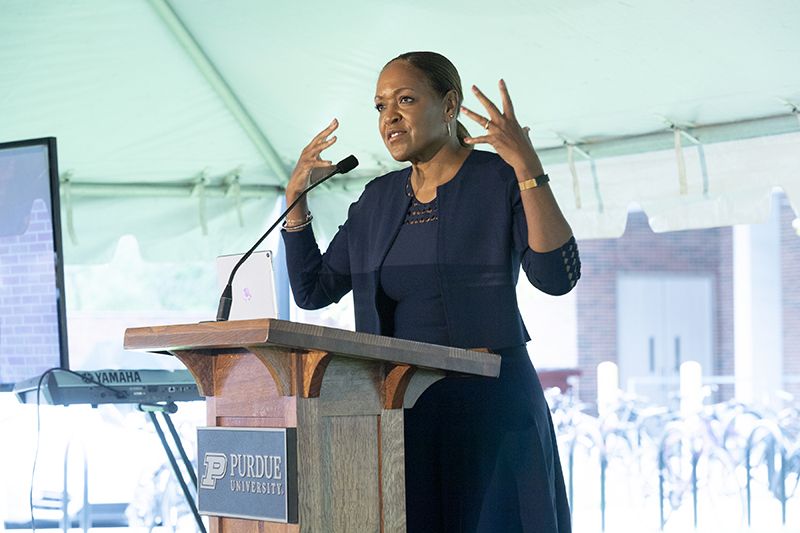 Adrienne White-Faines speaking at the renaming ceremony.