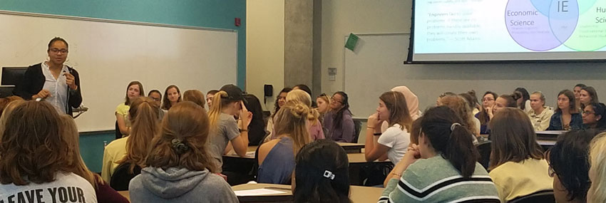 Women offering advice at an engineering seminar.